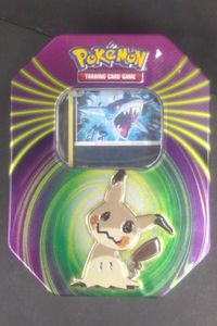 Pokemon TCG Dark Pokemon Assortment in Collectible Tin