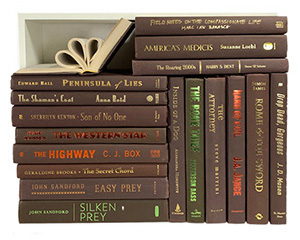 Assorted dark brown books